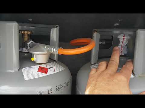 Video: Hoe Een Container Met Gasflessen Te Openen