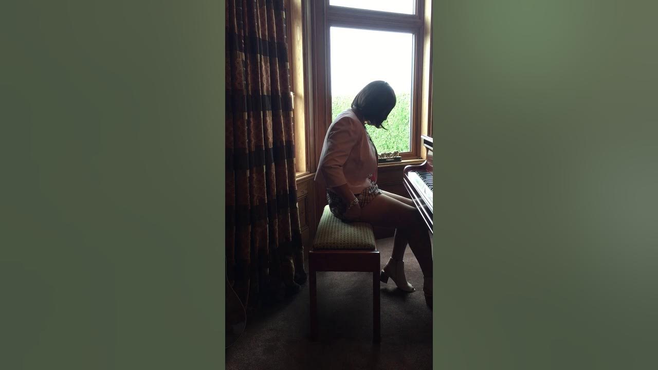 Crossdresser playing her piano - YouTube