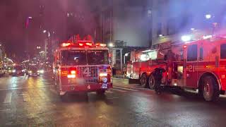 Fdny Ladder 4 Responding On 8Th Avenue In The Hells Kitchen Area Of Manhattan In New York City.