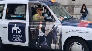 The household Cavalry foundation advertisement on a black taxi #london