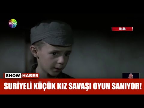 Suriyeli küçük kız savaşı oyun sanıyor!