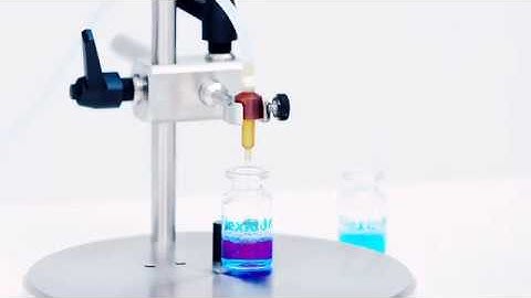 Flexicon PF7 tabletop peristaltic liquid filling machine