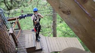 Our zipline guide shows how he does a rescue on the line.