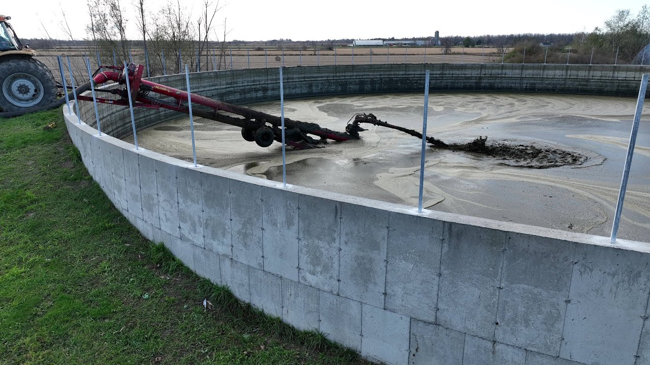 CANADIAN FARMER - PUMPING 1.2 million gal.  or 5 million L  of liquid manure to a field a mile away!
