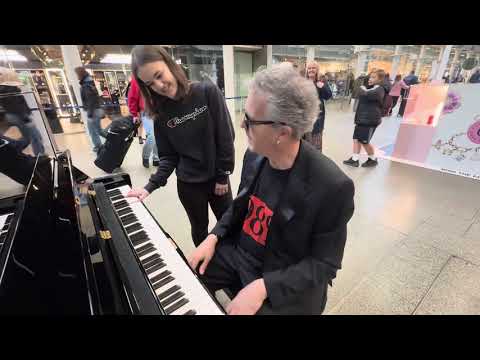 Instructing A Newbie At The Public Piano
