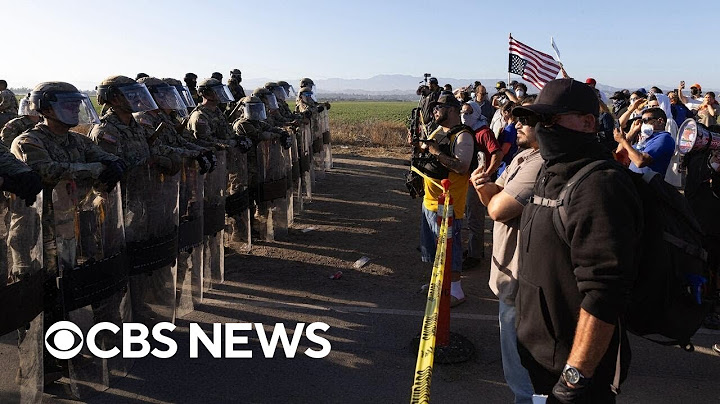Migrants hide from ICE agents after farm raid, clash with protesters