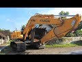 Excavator And Compactor Transport by Fuso Self Loader Truck Hyundai RH210 Volvo EC210B