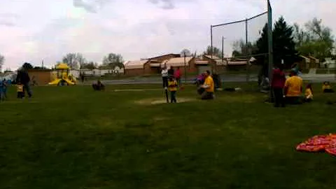 Olivia batting at T-ball