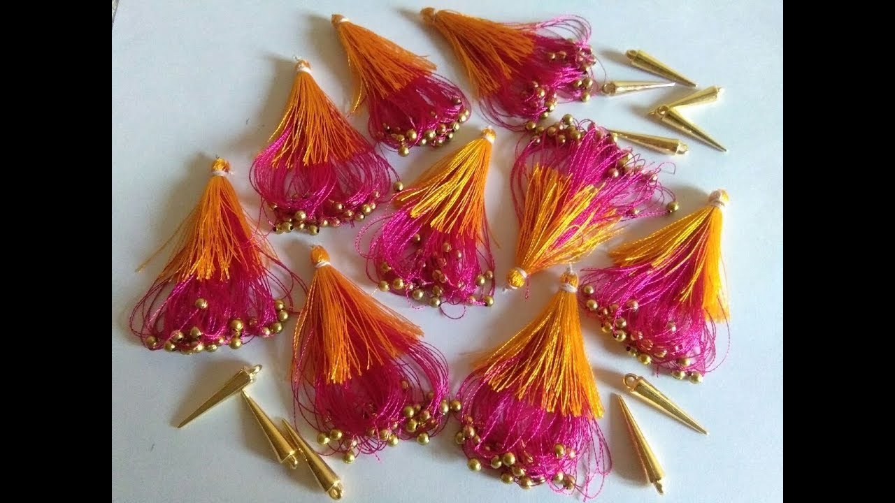 Image result for Using 2 colors of silk thread how to make easy and latest kuchu /tassels for fancy silk Sarees