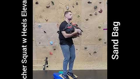 Zercher Squat with Heels Elevated- Sandbag / Ramp