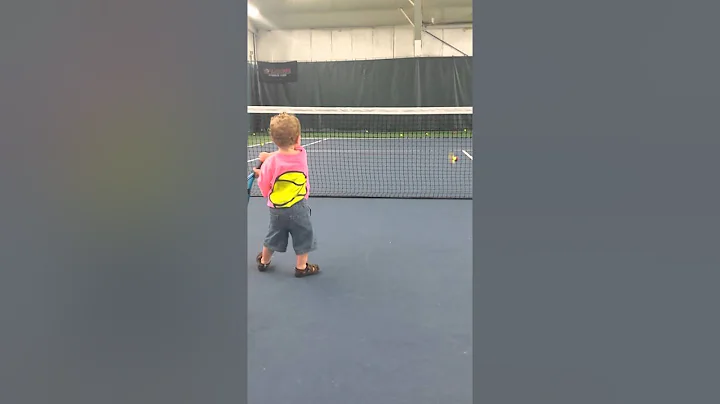 Ryder playing tennis by himself