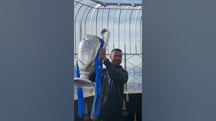 Ashley Cole from Chelsea FC  Brings the UEFA Champions League Trophy to the Empire State Building