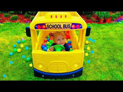 Little girl pretend play driver of School bus / Wheels on the bus