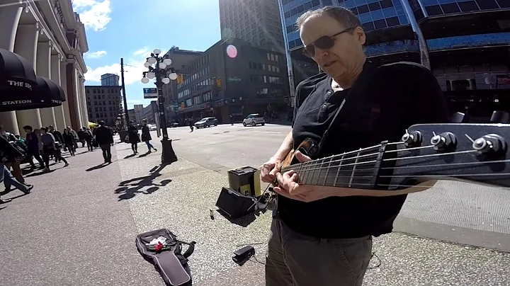 Sultans of swing - Unemployed Vancouver busker makes Knopfler's jaw drop
