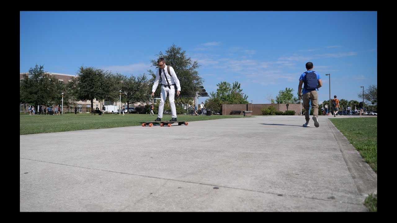 RIDING TWO BOOSTED BOARDS IN COLLEGE - YouTube