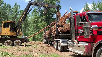Tigercat 234B Loading 12,000 Pounds Every Grapple Full!!!