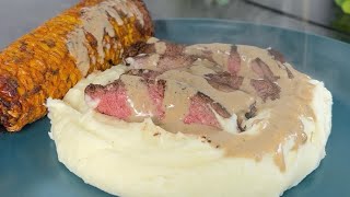 Mashed Potatoes, Steak, corn on the cob with Peppercorn Sauce