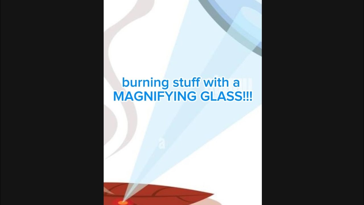 Using a magnifying glass to burn leaves,paper, and cardboard