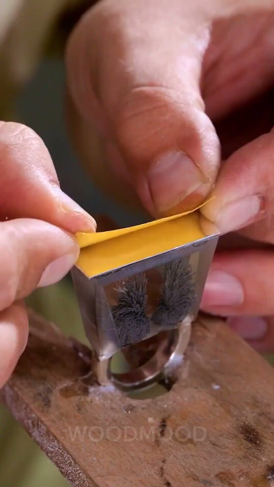 You know what you need? A Silver ring with a magnetic touch ?