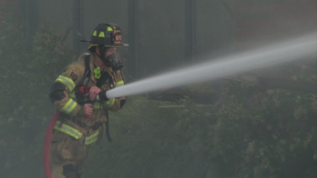 Crews respond to fire in old IGA building on Sullivan Street in ...