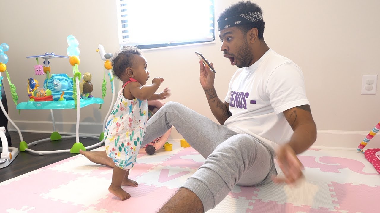 baby taking first steps