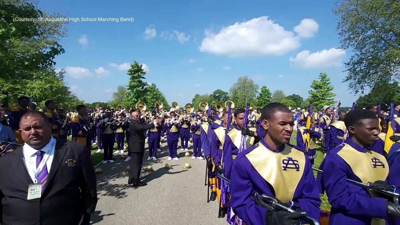 St. Augustine High School marching band performs in Normandy for D-Day ...