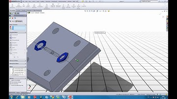 SolidWorks tutorial: using mold tools to make a split cavity.