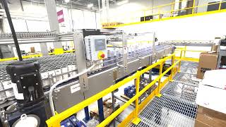 E329601 - Axon Sl-150 Shrink Sleeve Applicating Line With Ska Fab Depalletizer And Palletizer