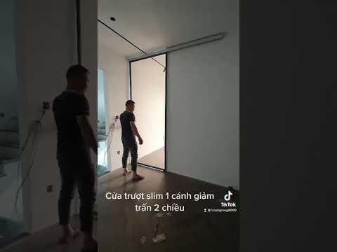 Video Cửa slim trượt 1 cánh kính màu trà, cánh dấu sau tường - youtube