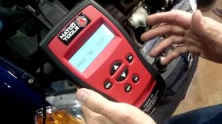Testing a battery with a handheld tester