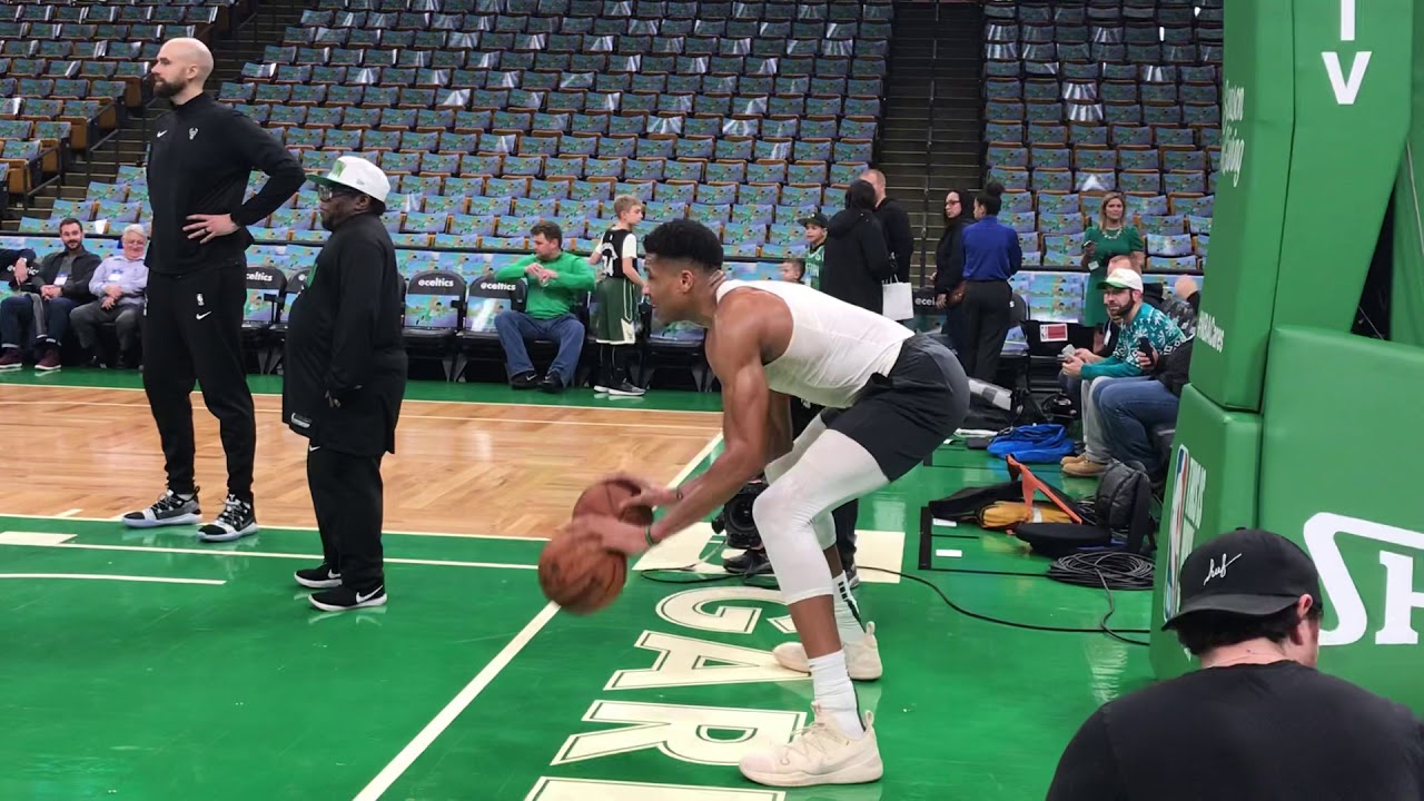 Giannis Antetokounmpo goes through twobasketball dribbling warmup