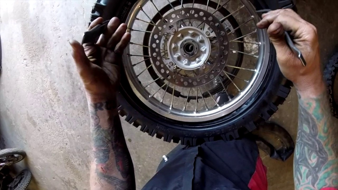 Changing a dirt bike tire with Highland Cycles YouTube