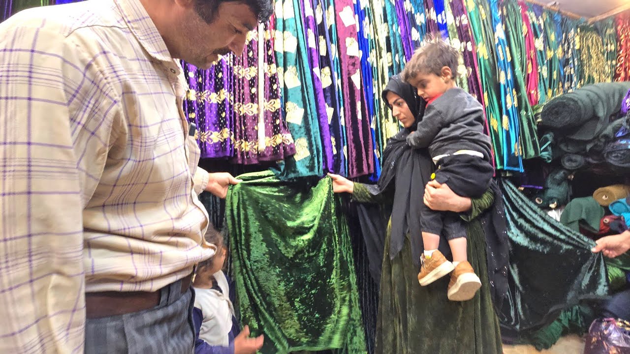 Buying local women's clothes by Mr. Ghorban for his sister