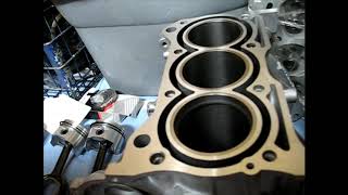 1992 Geo Metro 1L 3 cyl engine rebuild playlist part 2 Pistons going in