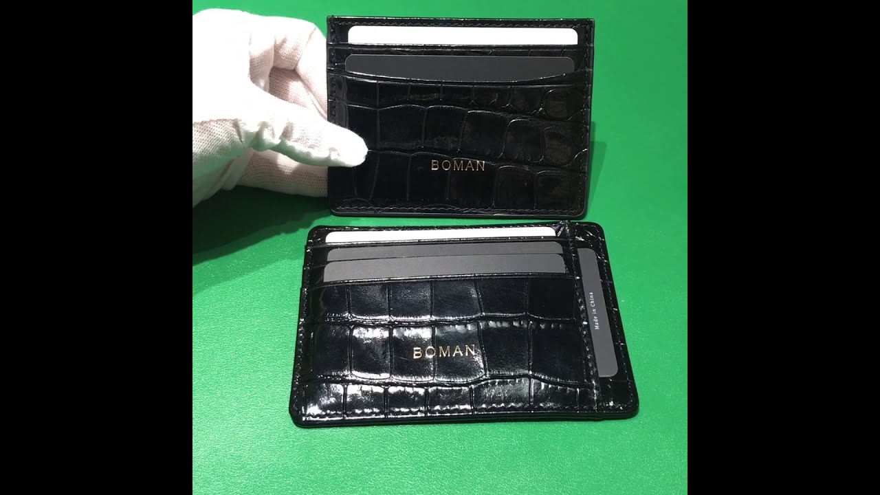 Crocodile pattern leather card holder.