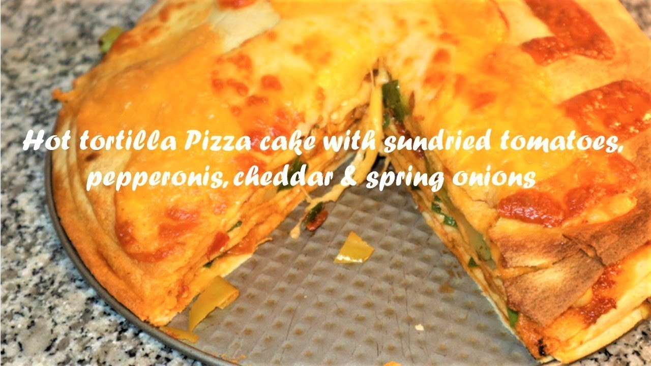 Hot tortilla Pizza cake with sundried tomatoes, pepperonis, cheddar & spring onions recipe