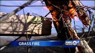 KC fire crews battle large Northland grass fire