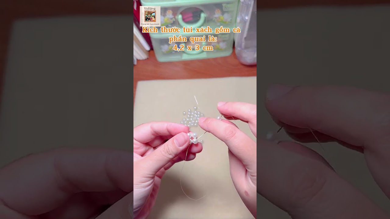 Móc khoá túi xách ngọc trai 