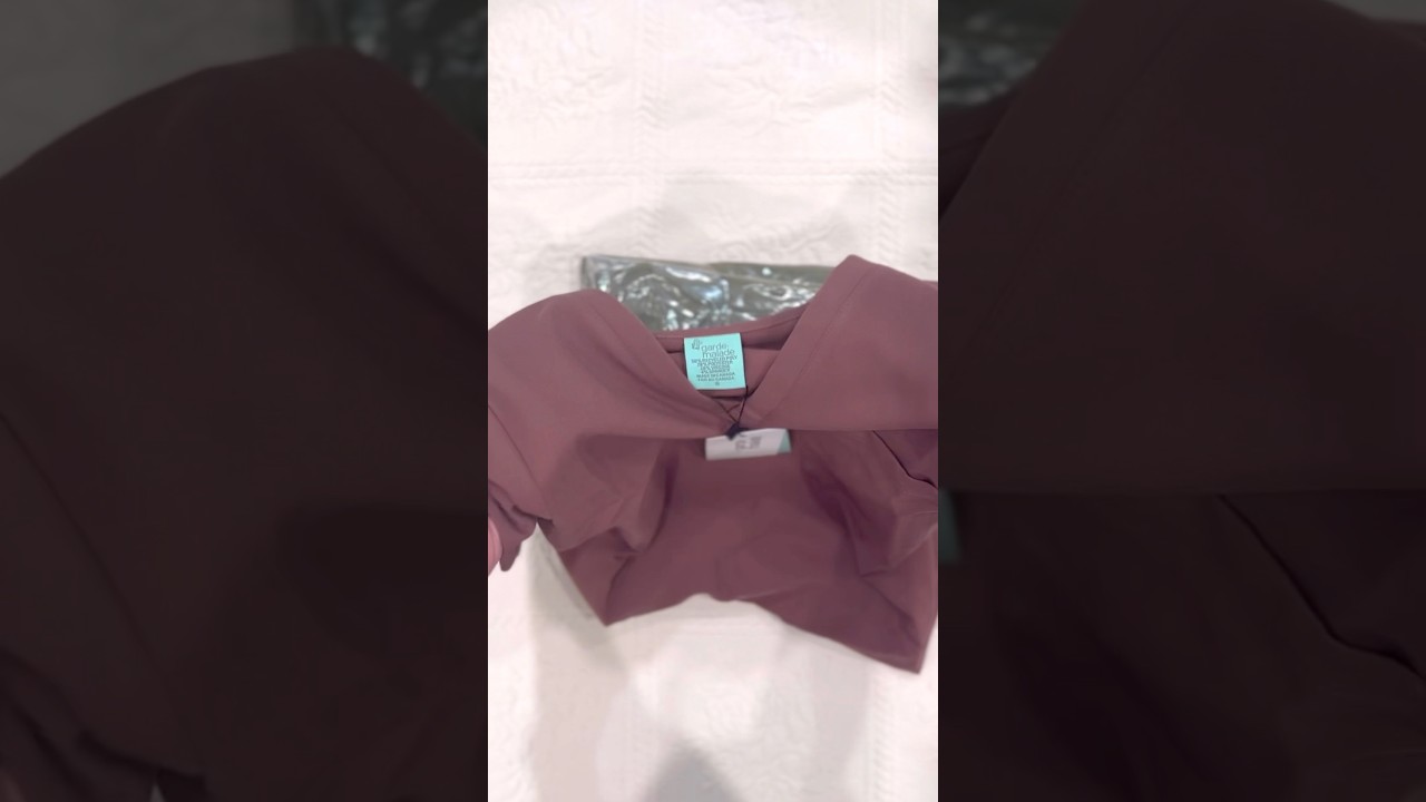 Unboxing my first nurse uniform from Garde Malade. Excited to try something new! 