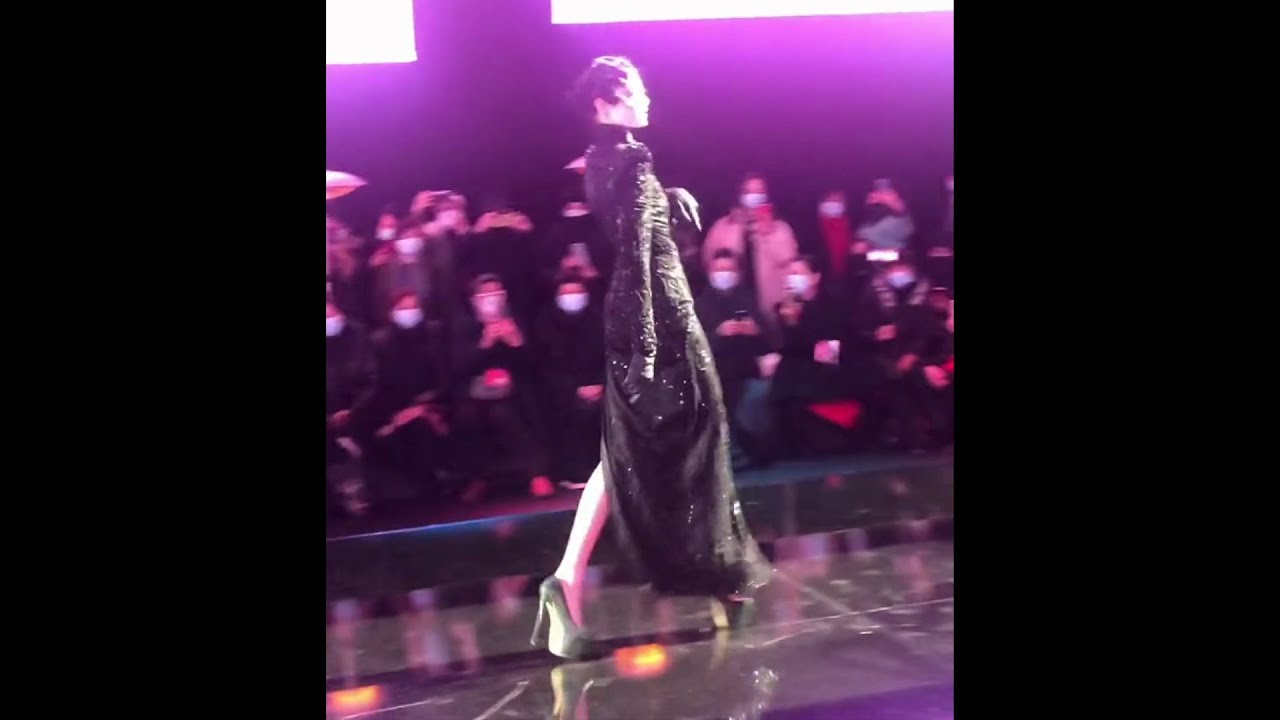 Model FALLS during Sheguang Hu "Fashion Women's Army" December 2020 Show – 2 angles of view