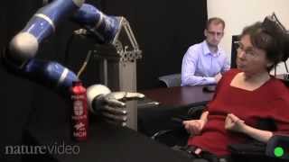 Paralyzed woman moves robot with her mind.mp4