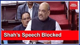 Opposition disrupts amit shah's speech in rajya sabha on farmers'
crisis