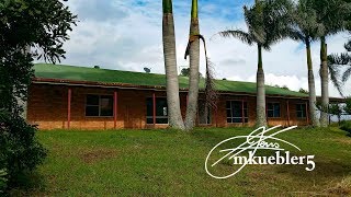 Abandoned  Sprawling HUGE duplex farm house with even huger shed