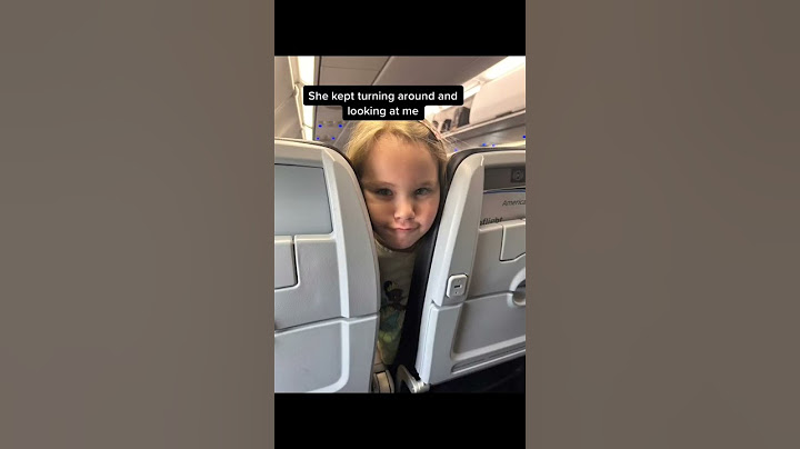 Annoying kid on my flight. Yes it's my daughter.