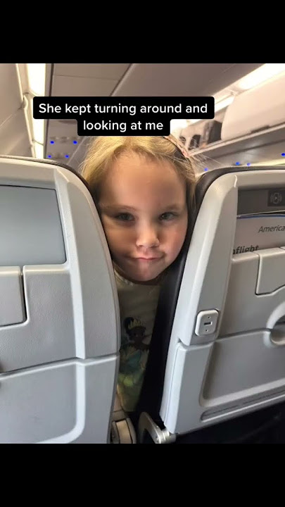 Annoying kid on my flight. Yes it's my daughter.