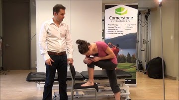 Physio Exercise - Lumbar Flexion In Step Standing