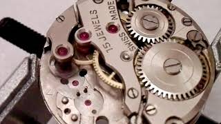 Dirty watch movement AFTER CLEANING, gear train unwinds quicker