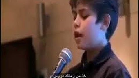 طفل يقرأ سورة الرحمن بصوت عذب ستحبه