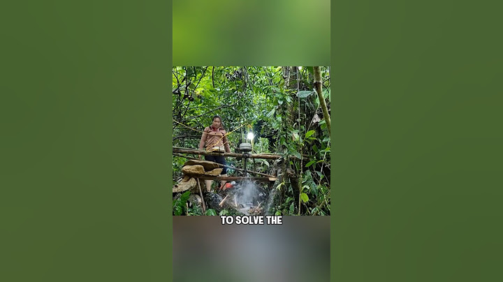 A woman built a small hydroelectric power station by the stream using two bamboos #shorts