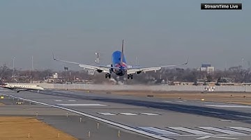 Southwest flight aborts landing to avoid potential crash with jet at Midway: VIDEO